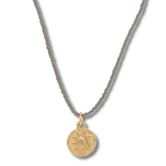 219NLGCC - Mini Sun Print in Gold on Charcoal Beads