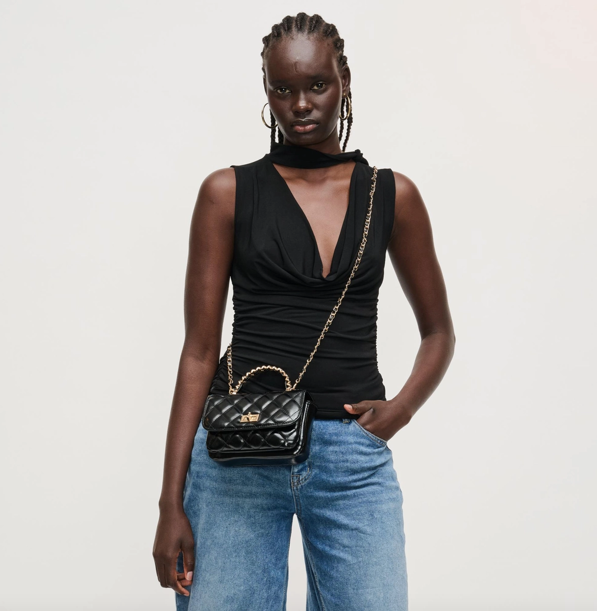 Leo Quilted Cross Body Bag in black