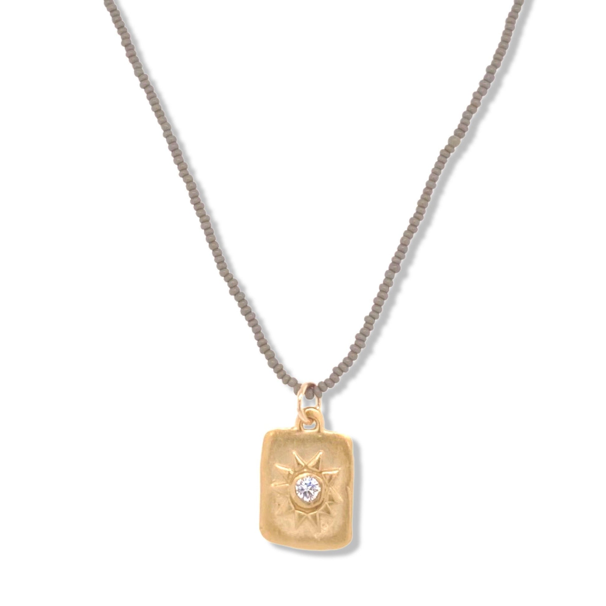 Ash necklace in gold on tiny charcoal beads | Nalu | Nantucket